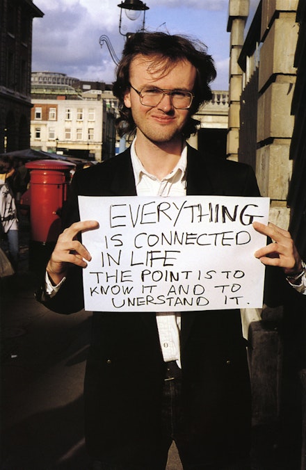 Gillian Wearing, <i>Signs that say what you want them to say and not Signs that say what someone else wants you to say</i>, “EVERYTHING IS CONNECTED IN LIFE THE POINT IS TO KNOW IT AND TO UNDERSTAND IT,” 1992-3. C-type print. © the artist, courtesy Maureen Paley, London.