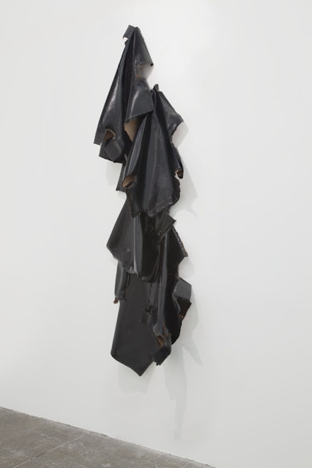 Danh Vo, “Two Kennedy Administration Cabinet Room Chairs,” 2013. Leather, 102 x 29 x 17”. Courtesy of the artist and Marian Goodman Gallery, New York.