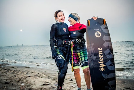 Luba, left, takes kite surfing lessons from Nina, right, who despite her SoCal look is actually a Russian gal who teaches daring Brooklynites how to navigate the winds under the Belt Parkway in Plum Beach.