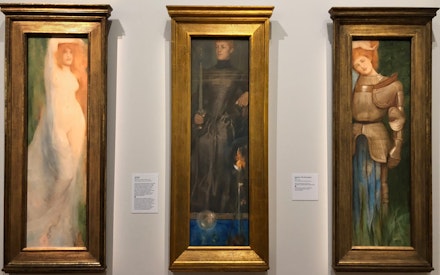 Fernand Khnopff (1858-1921), <em>Solitude </em>or <em>L'Isolement</em><em>Triptyque</em>: <em>Acrasia</em>, 1897, and <em>Britomart</em>, 1892. Both oil on canvas, 150.8 x 45 cm. Brussels. Musées royaux des Beaux-Arts de Belgique, Région de Bruxelles-Capitale, dation Gillion-Crowet; <em>Solitude</em>, 1890-91, Pastel and wax on paper mounted to canvas, 150 x 43 cm. Collection Ferdinand W. Neess, musée de Wiesbaden.