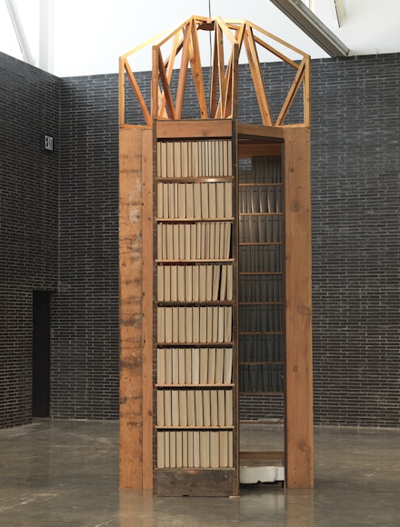 Theaster Gates, <em>New Egypt Sanctuary of the Holy Word and Image</em>, 2017. Wood, marble, bound periodicals, found objects, and light, 188 x 81 x 72 inches. © Theaster Gates. Photo: Robert McKeever. Courtesy Gagosian.