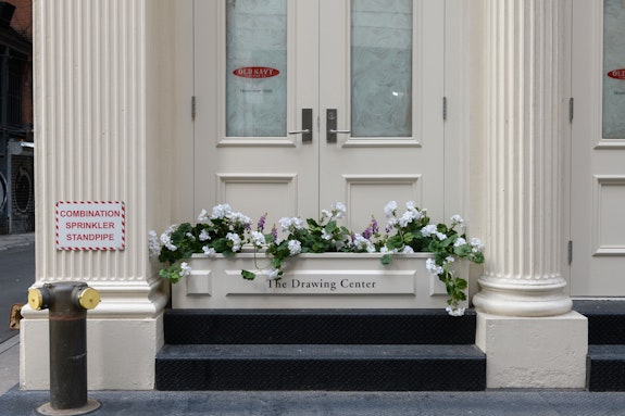 ART CLUB<em>2000</em>, <em>Untitled (What Ever Happened to the Drawing Center Planters/Proposal for Two Semi-Permanent Planters)</em>, 1996. Painted wood, vinyl lettering, silk flowers, mulch. Courtesy Artists Space, New York. Photo: Filip Wolak.