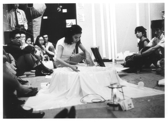 Mieko Shiomi, <em>Water Music</em>, performance during the Flux Week at Gallery Crystal, Tokyo, 1965. Photo: Teruo Nishiyama.
