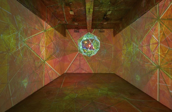 Olafur Eliasson, <em>Edgy but perfect kinship sphere</em>, 2020. Color-effect filter glass (pink), color glass (green), stainless steel, LED system, diameter: 43 1/4 inches. Courtesy the artist and Tanya Bonakdar Gallery, New York / Los Angeles.
