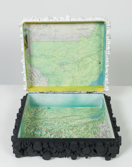 Regina Bogat, <em>Solola</em>, 1986. Acrylic, wood, paper, wooden box with hinged lid 4 x 13 x 11 inches. Courtesy Zürcher Gallery, NY / Paris.