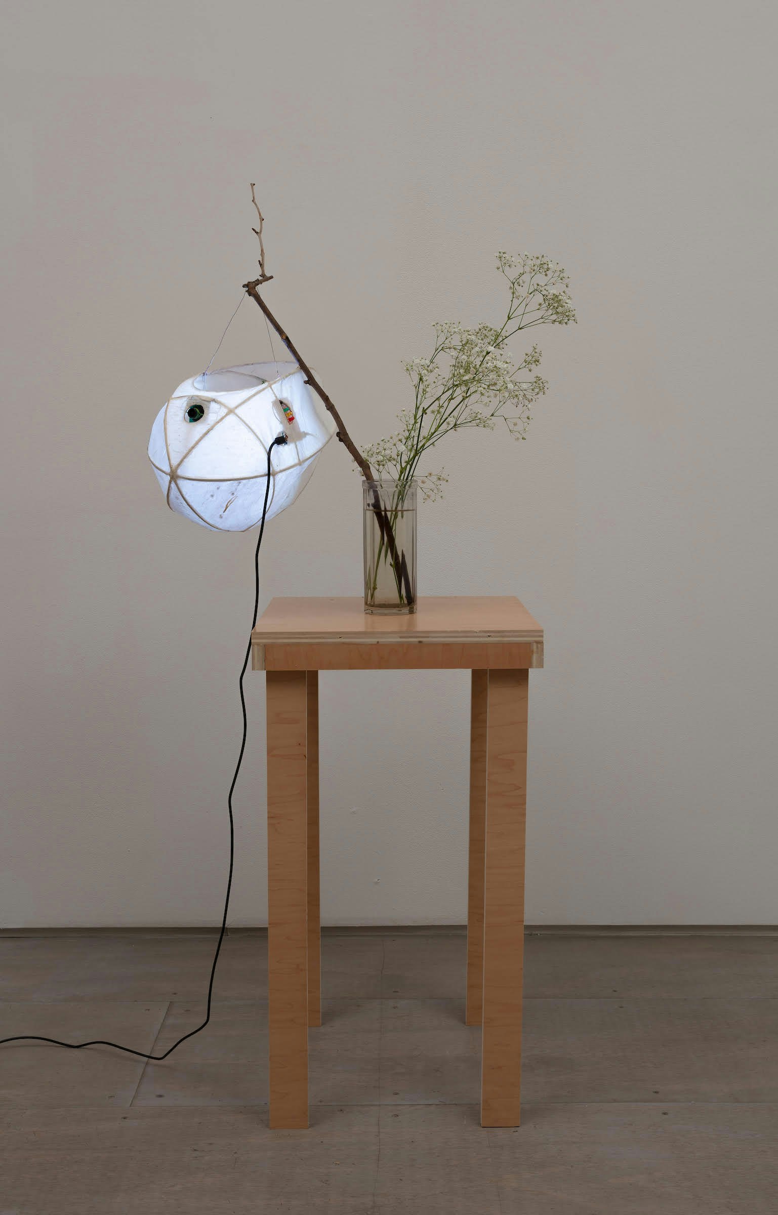 Cici Wu, <em>Foreign Object #2 Umbra and Penumbra (+852 carambola)</em>, 2021. Bamboo wire, paper, glue, metal wire, neopixel led, opencv camera, raspberry pi 4B, power adapter board, switch, led, micro-usb cable, lithium battery, memory card, artist’s lantern holder and plinth, 51 1/2 x 20 1/2 x 14 3/4 inches. Courtesy 47 Canal. Photo: Joerg Lohse.