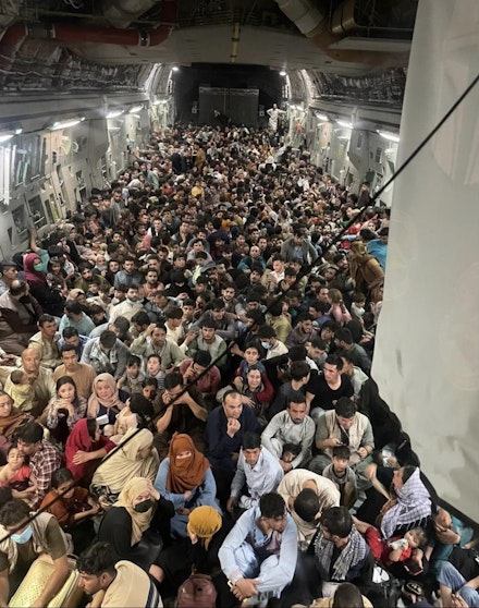 823 Afghan citizens leave from Hamid Karzai International in a U.S. Air Force vessel, 2021. Courtesy the U.S. Air Force. 