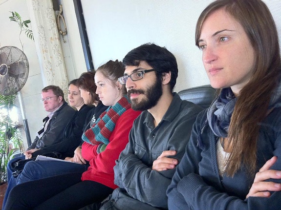 Students watching the Merce Cunningham Studio practice a performance, 2011. Courtesy Kareem Estafan.