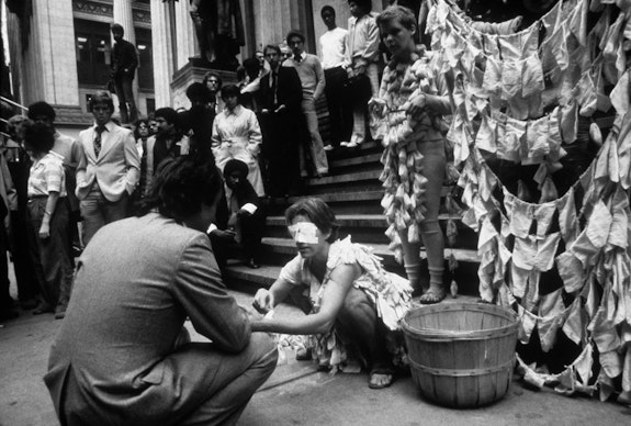 Betsy Damon, <em>Blindbeggar Woman</em>, performance on Wall Street, New York, October 18, 1979. Archival print. © Betsy Damon 1979/2021. Courtesy the artist.
