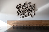 Mel Kendrick, <em>Thinking of What, </em>2022. Ebonized mahogany and gesso, 119 x 140 4 ½ inches. Courtesy the artist and David Nolan Gallery. Photo: Gary Mamay.