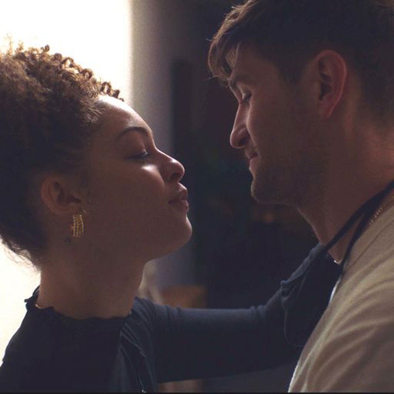 Dion Costelloe as “Luca,” Liz Caribel Sierra as “Regina” in Daniel Antebi’s <em>Gods Time</em>. Courtesy IFC Films. An IFC Films Release.