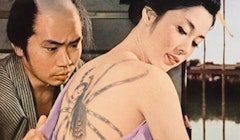 Hasegawa Akio anxiously eyes Wakao Ayakos killer tat. Courtesy Kadokawa Pictures, Inc.