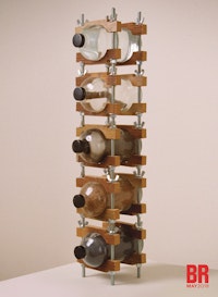 Mel Chin, <em>Vertical Palette</em>, 1976-86. Lead, wood, water, smoke, clay, in scientific glass storage bottles with Bakelite caps in artist-designed rack of oak and steel, 28 1/4 x 6 1/4 x 8 1/2 inches. Courtesy the artist.